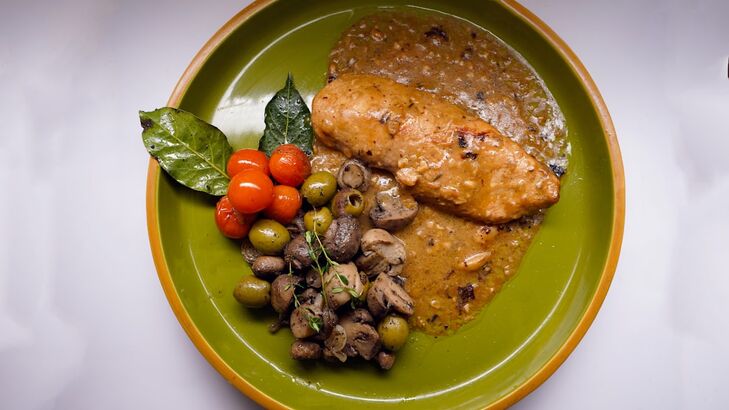Saiblingfilet mit Salbei im Serrano-Schinken-Mantel
mit Risotto